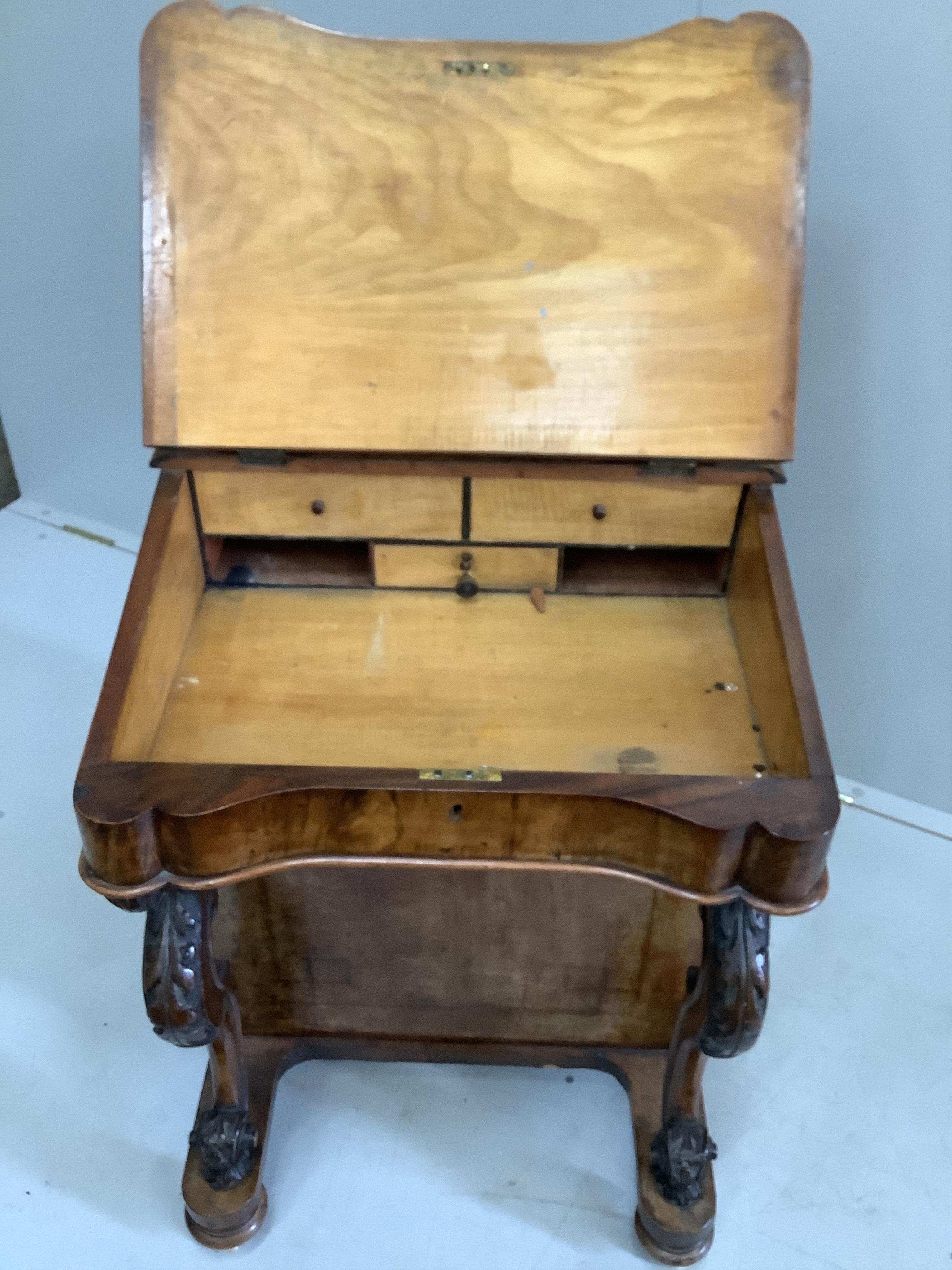 A Victorian walnut and marquetry inlaid Davenport, width 53cm, depth 53cm, height 82cm. Condition - fair